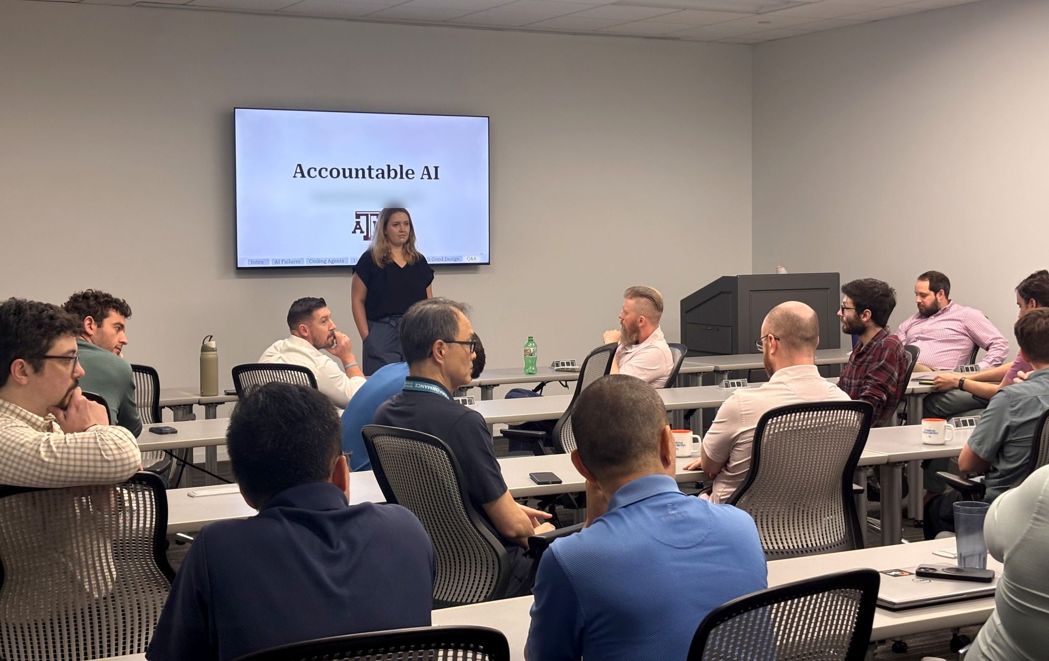 Maria Teleki giving her Accountable AI talk to a full room at IPT Global